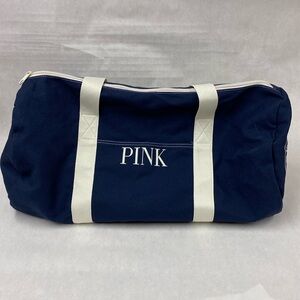 Pink brand. Blue duffel bag, new with tags